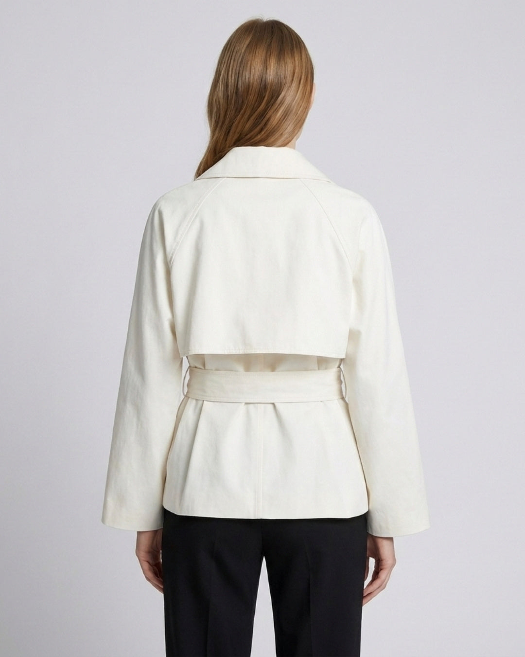 Harper short asymmetric double-breasted trench coat in beige, second model photo