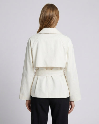 Harper short asymmetric double-breasted trench coat in beige, second model photo